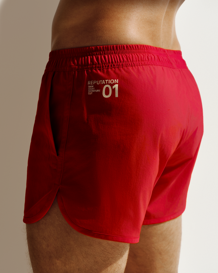 Reputation Signature Short 01 in crimson red, side view